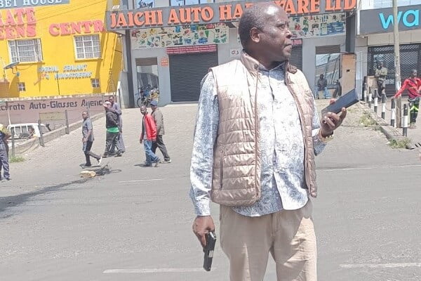 Angry Nakuru MP Samuel Arama draws his gun